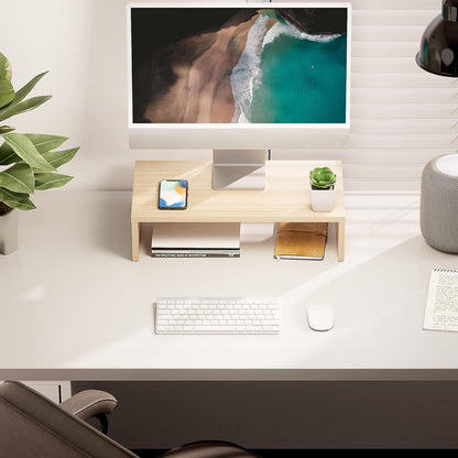 Rehausseur écran noir en situation bureau – moniteur iMac, téléphone, plante et livres dessous